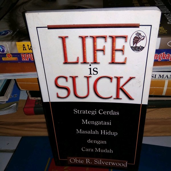 Cover Life Is Suck Strategi Mengatasi masalah hidup Dengan Cara Mudah / Obie R Silverwood