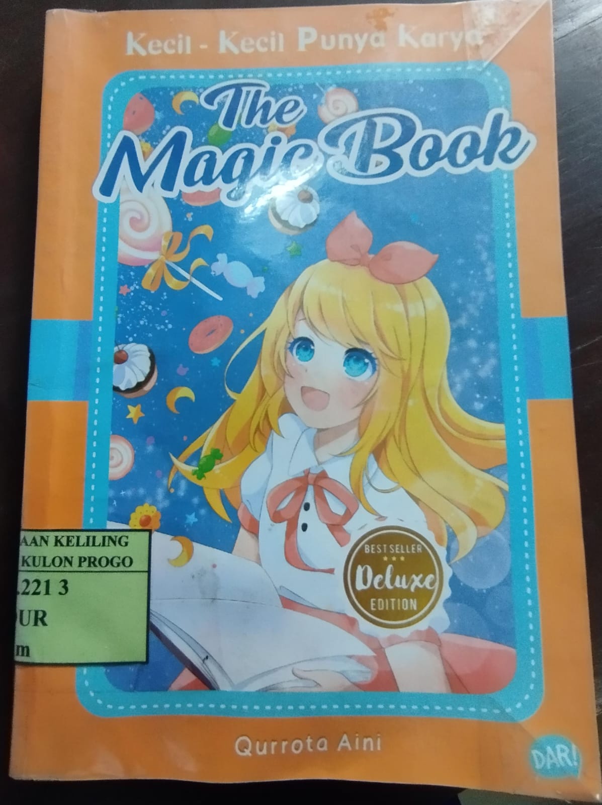 Cover KKPK The Magic Book / Qurrota Aini